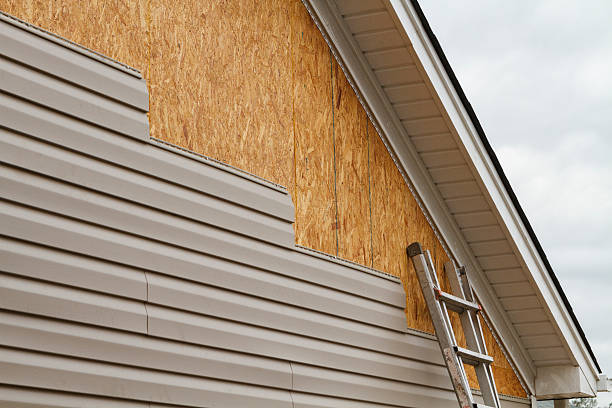 Professional Siding Replacement technician working in Ashland, PA